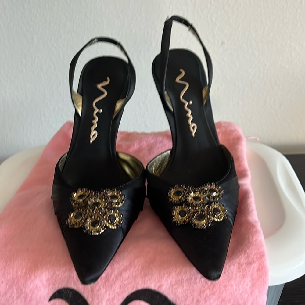 Nina sling back shoes.  Very classy.  In excellent condition, beautiful jewels